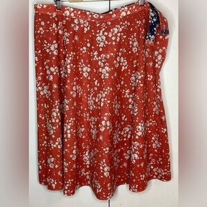 Reversible handmade skirt blue/white floral or red/white floral.with 34” waist.